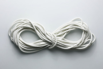 White rope on a grey background