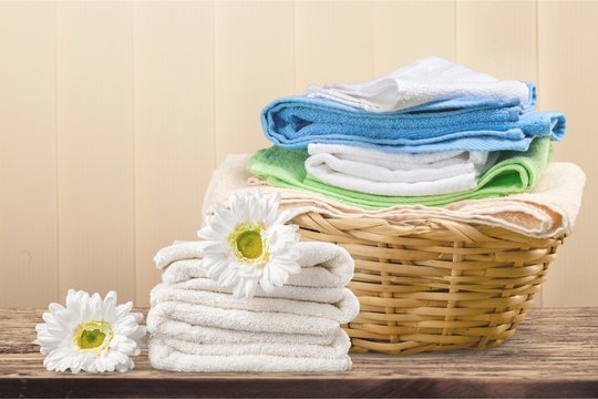 Laundry Basket With Colorful Towels
