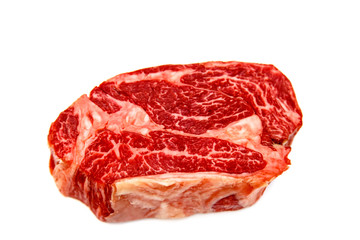 Raw marbled beef, Chuck roll steak on white background.
