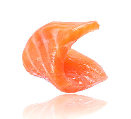 Juicy slice of salmon close-up isolated on white background