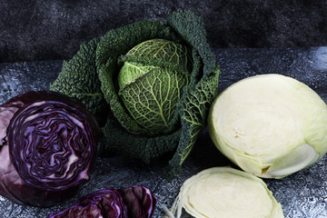 Three fresh organic cabbage heads. Antioxidant balanced diet eating with red cabbage, white cabbage...