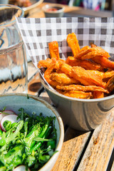 Lunch with Salad from grilled Broccoli and Baked Sweet Potato Fries
