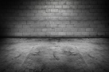 Empty grey concrete floor and block wall. Room. Garage