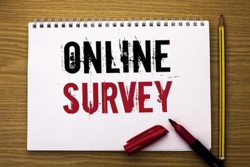 Writing note showing  Online Survey. Business photo showcasing Digital Media Poll Customer Feedback Opinions Questionnaire written on Notebook Book on the wooden background Marker and Pencil.