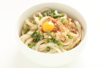 Japanese food, quail egg and fish flake on udon noodles