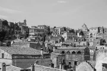 Sassi di Matera, landscape view on italian ancient cave town. UNESCO. Black and white