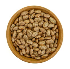Raw brown beans isolated on white background