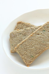 Asian food, oily fish cake on dish