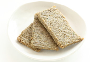 Asian food, oily fish cake on dish