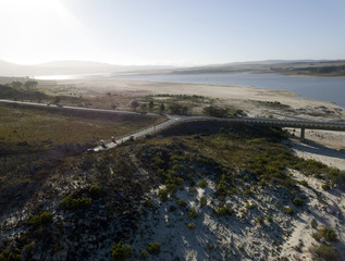 Fototapeta na wymiar Road at drought-stricken Theewaterskloof Dam, South Africa