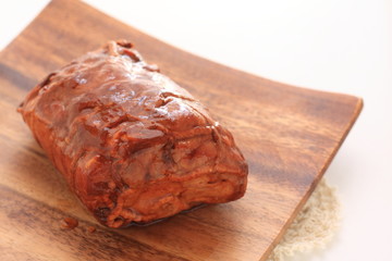 Chinese food, roasted pork on wooden plate