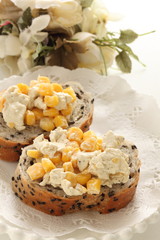sweet corn and cream cheese on black sesame bread