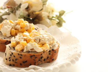 Cream cheese and sweet corn open sandwich