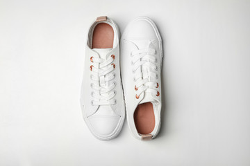 Pair of casual shoes on white background