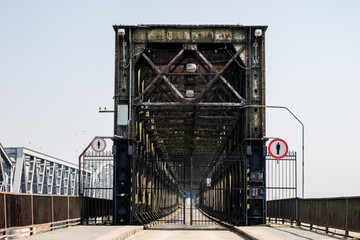 Bridge crossing across a large river. Truss bridge in the city of Tczew in Poland.