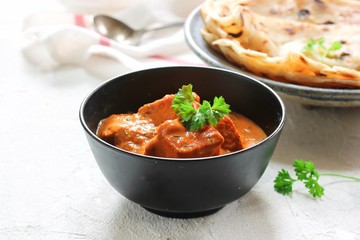 Homemade Paneer Butter Masala served with Paratha