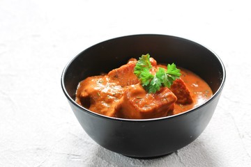 Homemade Paneer Tikka Masala on white background