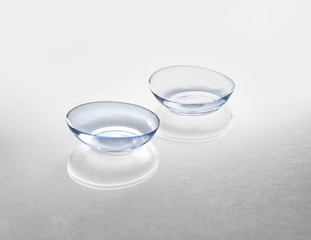 Contact lenses on light background