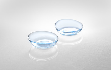 Contact lenses on light background
