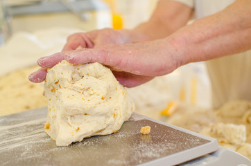Preparing dough in a bakery.