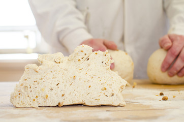 Preparing dough in a bakery.