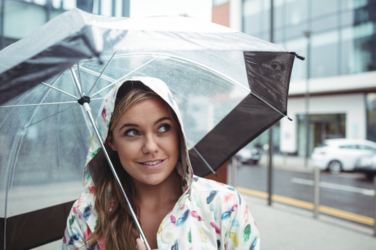 Beautiful woman holding umbrella