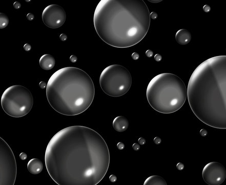 Abstract of round globes floating against a black background
