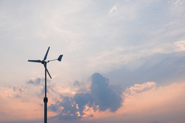 A windmill with a beautiful sunset backdrop nature
