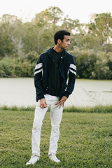 Young Male Model Posing in Front of Pond