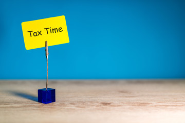 Tax time - Notification of the need to file tax returns, tax form at accauntant workplace. With...
