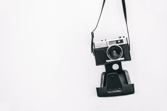 Vintage camera isolated at white wall