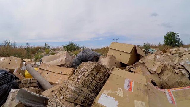camera moves over elongated cardboard boxes. Slow motion.