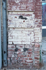 Brick support post in a downtown building in Anniston, Alabama, USA