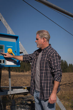 Man using machine in field