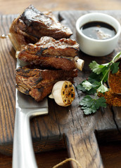 Beef ribs cooked grill on wooden board