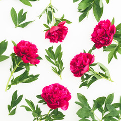 Floral composition with peony flowers on white background. Flat lay, top view.