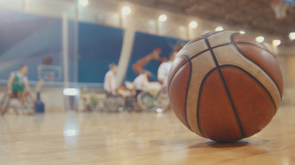 Ball of basketball during training for disabled wheelchair sportsmen
