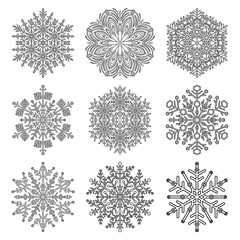 Set of vector snowflakes. Black and white winter ornaments. Snowflakes collection. Snowflakes for backgrounds and designs