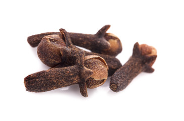 dry cloves on white background