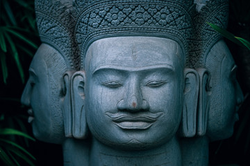 Fototapeta na wymiar Three Headed Buddha Statue
