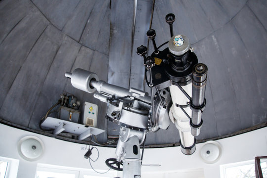 big telescope under dome of astronomic observatory