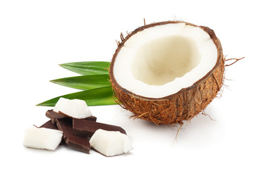 Coconut with chocolate and green leaves isolated on white background