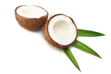 Coconut with green leaves isolated on white background