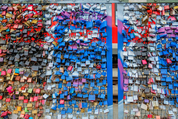 Colorful love padlocks on the Hohenzollern Bridge  in Cologne, Germany