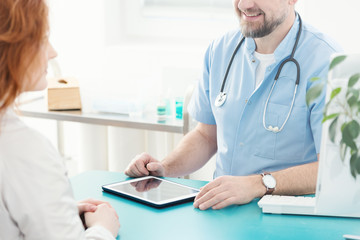 Patient talking to doctor
