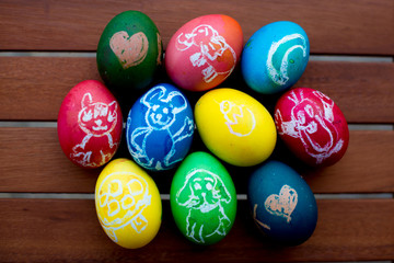 Colorful easter eggs with children drawings