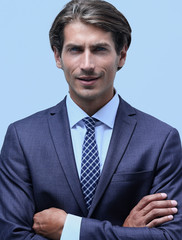 thoughtful businessman adjusting his tie.