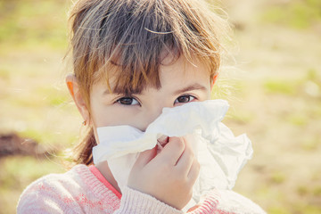 Seasonal allergy in a child. Coryza. Selective focus.  