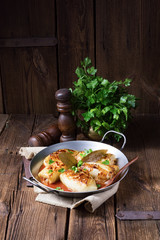 baked cabbage rolls in tomato sauce
