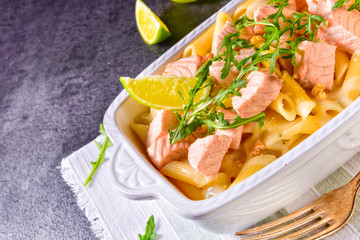 Salmon with penne noodle and arugula